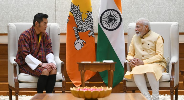 The King of Bhutan comes calling in delicate times
